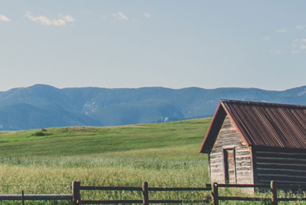 Historic barn in Montana field
